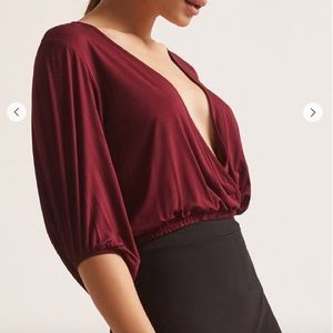 BRAND NEW deep V wrap top! Never been worn